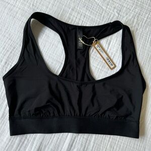 Skims track racer back. Size M.